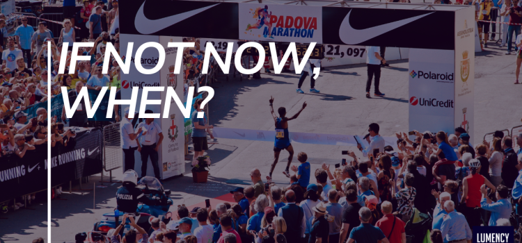 Athlete crossing the finish line of the Padova Marathon.